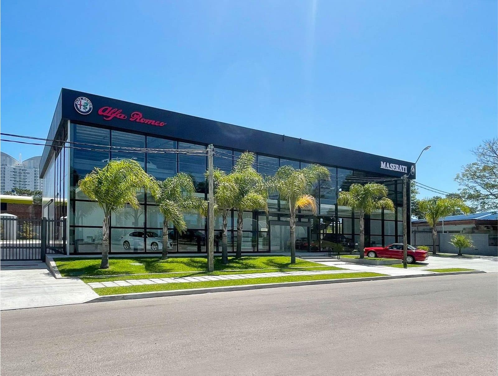 A two-storey glazed car showroom on a double-layer steel structure, completed
